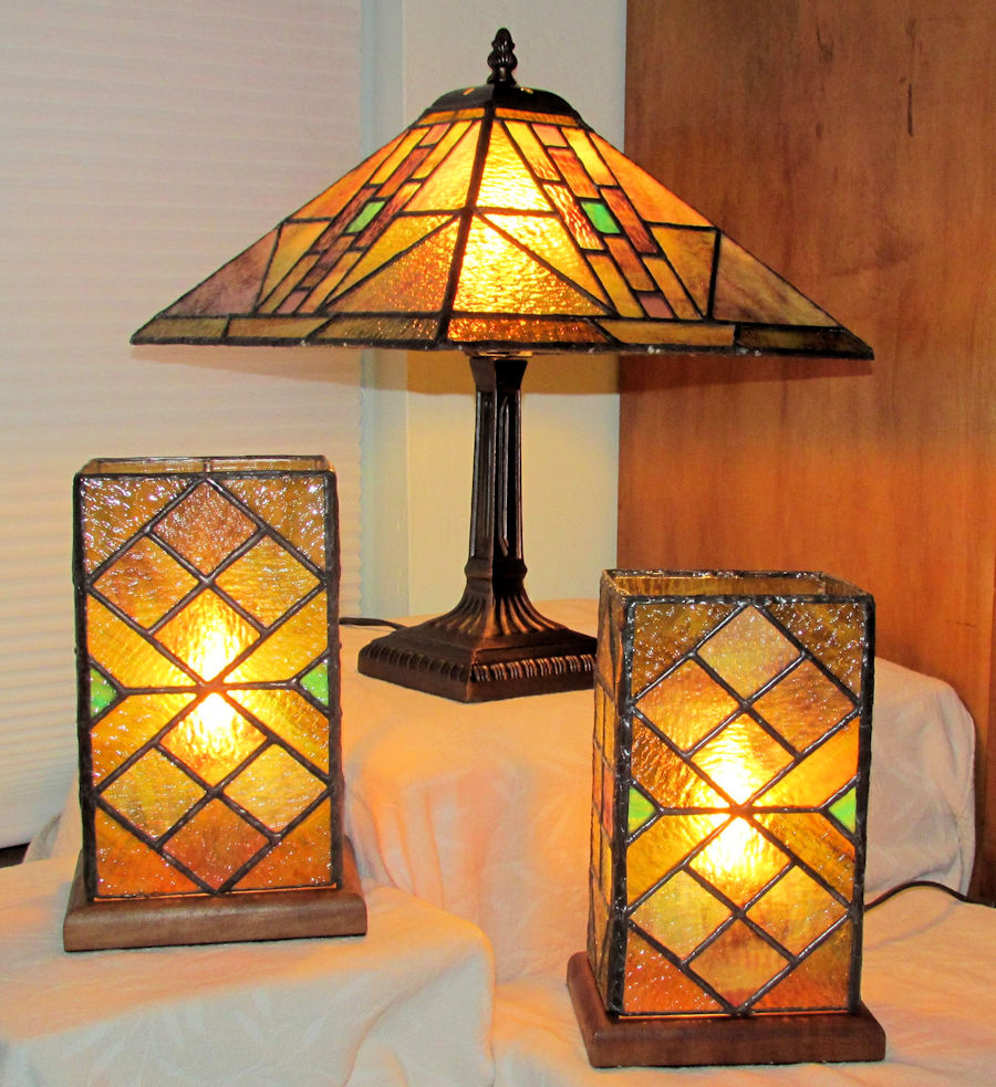 Lamp and table Lanterns from old stained glass windows salvaged after church was rebuilt.  The glass is more than 110 years old now.